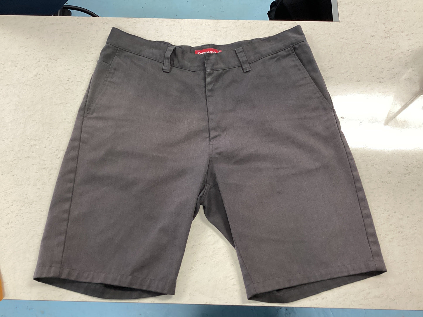 Supreme short grey