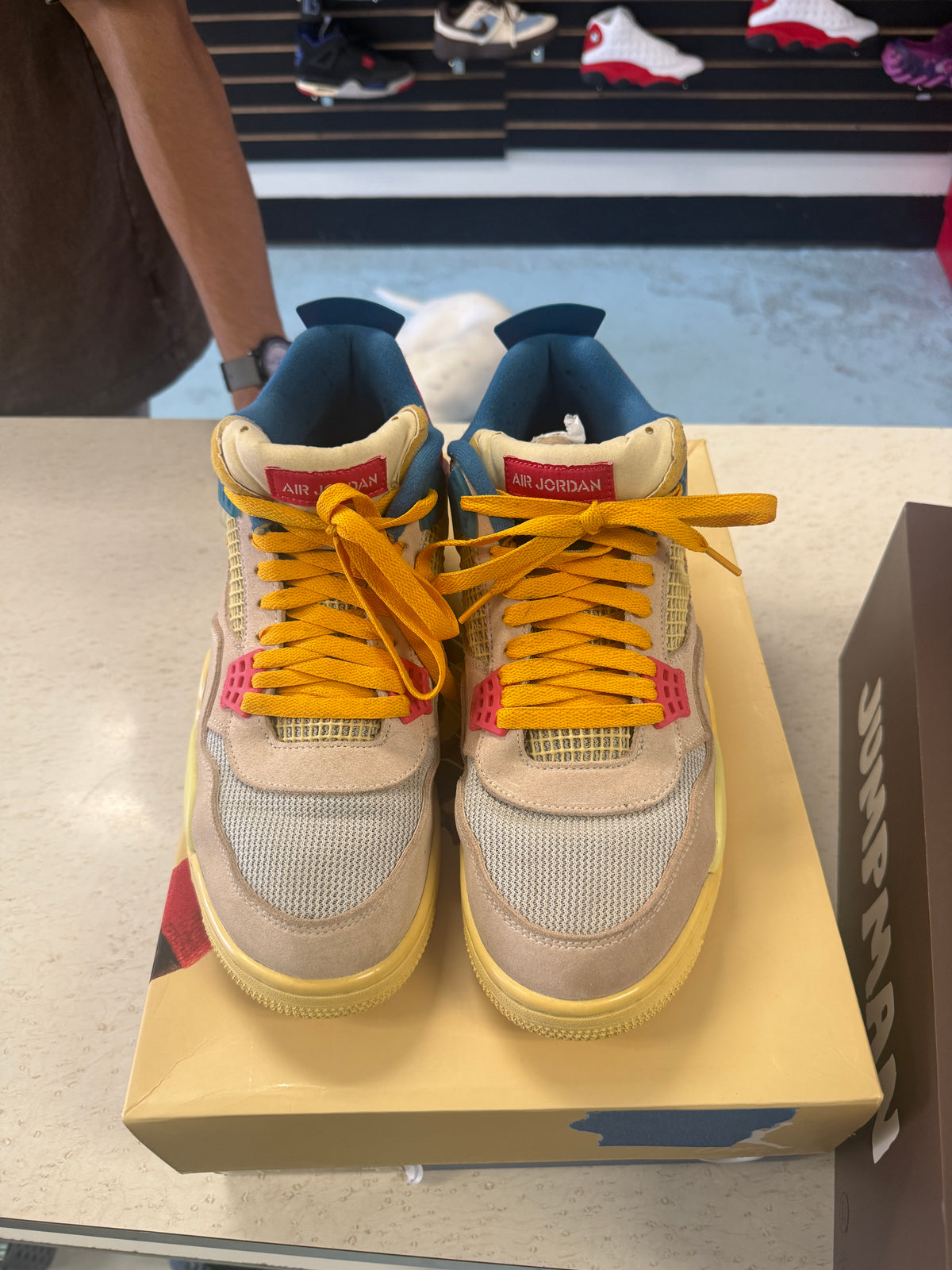 Jordan 4 Retro Union Guava Ice